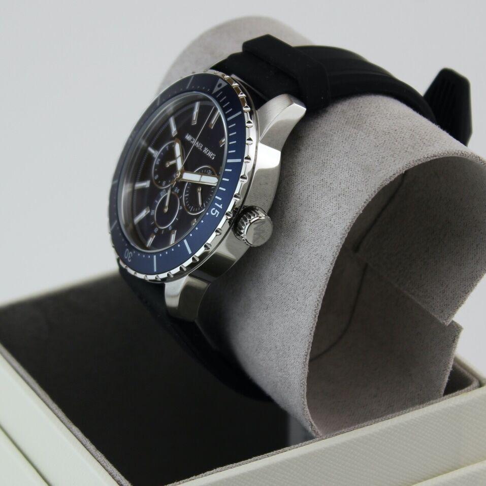 Shop Authentic Michael Kors Cunningham Multifunction Blue Dial Black Rubber Strap Watch For Men - MK7160 - Luxxuri