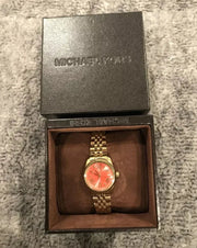  Shop Authentic Michael Kors Lexington Quartz Orange Dial Gold Steel Strap Watch For Women - MK3284 - Luxxuri