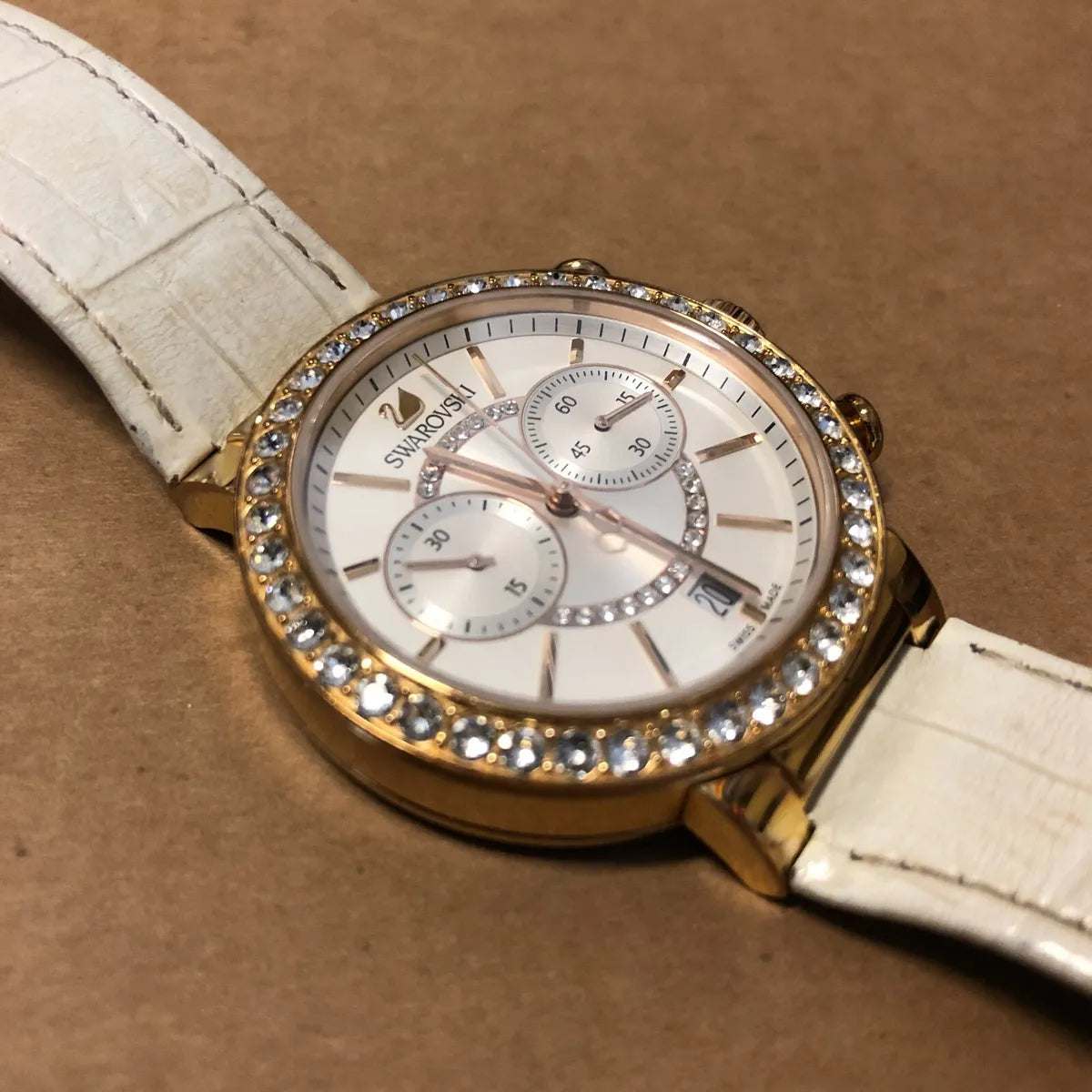  Shop Authentic Swarovski Citra Sphere Chrono White Dial White Leather Strap Watch for Women - 5080602 - Luxxuri
