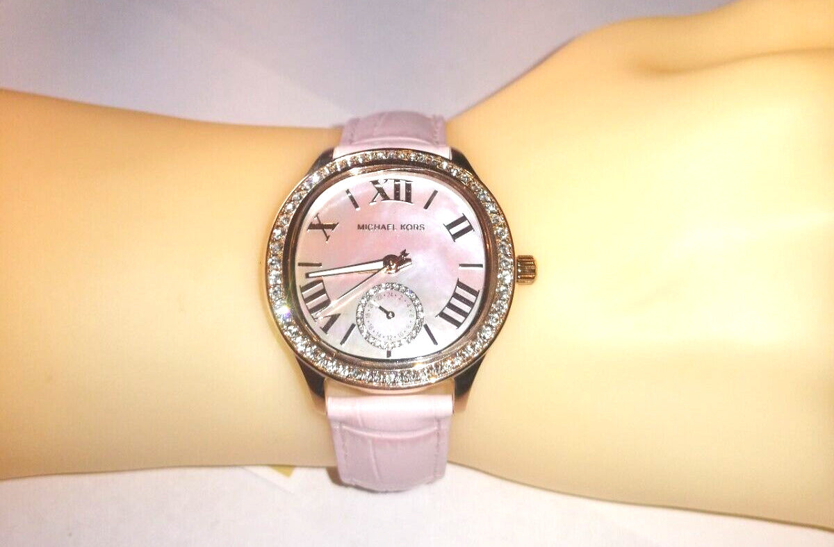  Shop Authentic Michael Kors Sage Three-Hand Mother of Pearl Pink Dial Pink Leather Strap Watch for Women - MK4820 - Luxxuri
