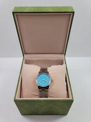  Shop Authentic Gucci G Timeless Quartz Turquoise Dial Silver Steel Strap Unisex Watch - YA1265044 - Luxxuri