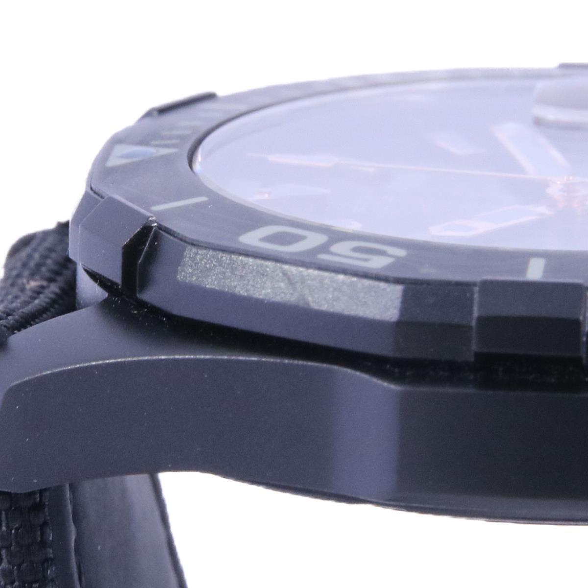  Shop Authentic Tag Heuer Aquaracer Calibre 5 Black NATO Strap Carbon Dial Watch for Men - WBD218A.FC6445 - Luxxuri