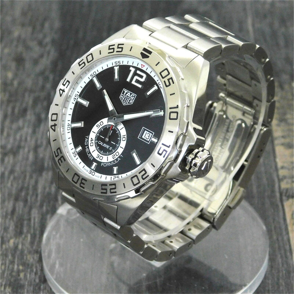  Shop Authentic Tag Heuer Formula 1 Automatic Black Dial Silver Steel Strap Watch for Men - WAZ2012.BA0842 - Luxxuri