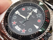  Shop Authentic Gucci Dive Quartz Black Dial Silver Steel Strap Watch For Men - YA136221 - Luxxuri