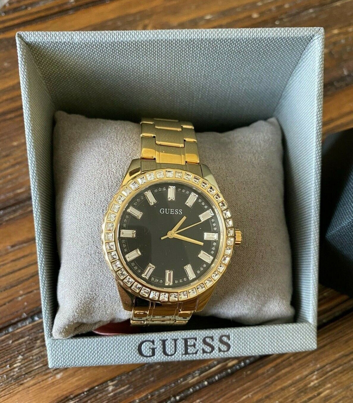  Shop Authentic Guess Sparkler Diamonds Black Dial Gold Steel Strap Watch for Women - GW0111L2 - Luxxuri
