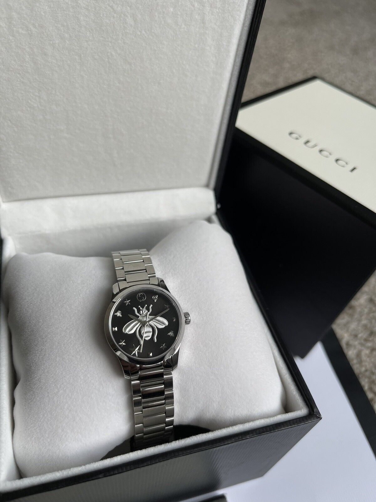  Shop Authentic Gucci G Timeless Quartz Diamonds Black Dial Silver Steel Strap Watch For Women - YA1265024 - Luxxuri