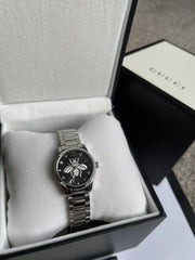  Shop Authentic Gucci G Timeless Quartz Diamonds Black Dial Silver Steel Strap Watch For Women - YA1265024 - Luxxuri