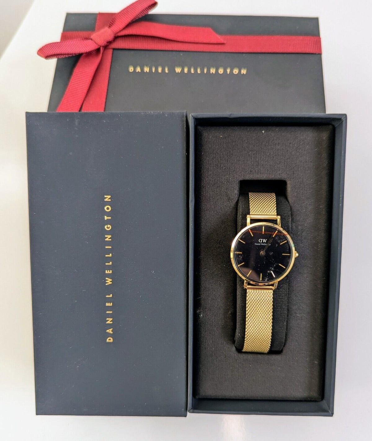  Shop Authentic Daniel Wellington Classic Petite Evergold Black Dial Gold Mesh Bracelet Watch For Women - DW00100349 - Luxxuri