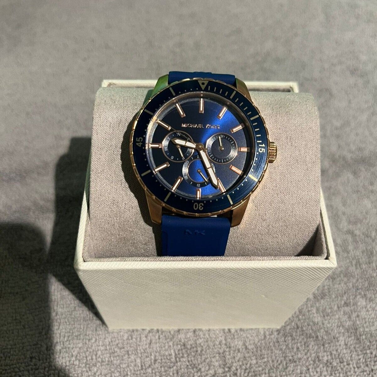  Shop Authentic Michael Kors Cunningham Multifunction Blue Dial Blue Rubber Strap Watch For Men - MK7163 - Luxxuri