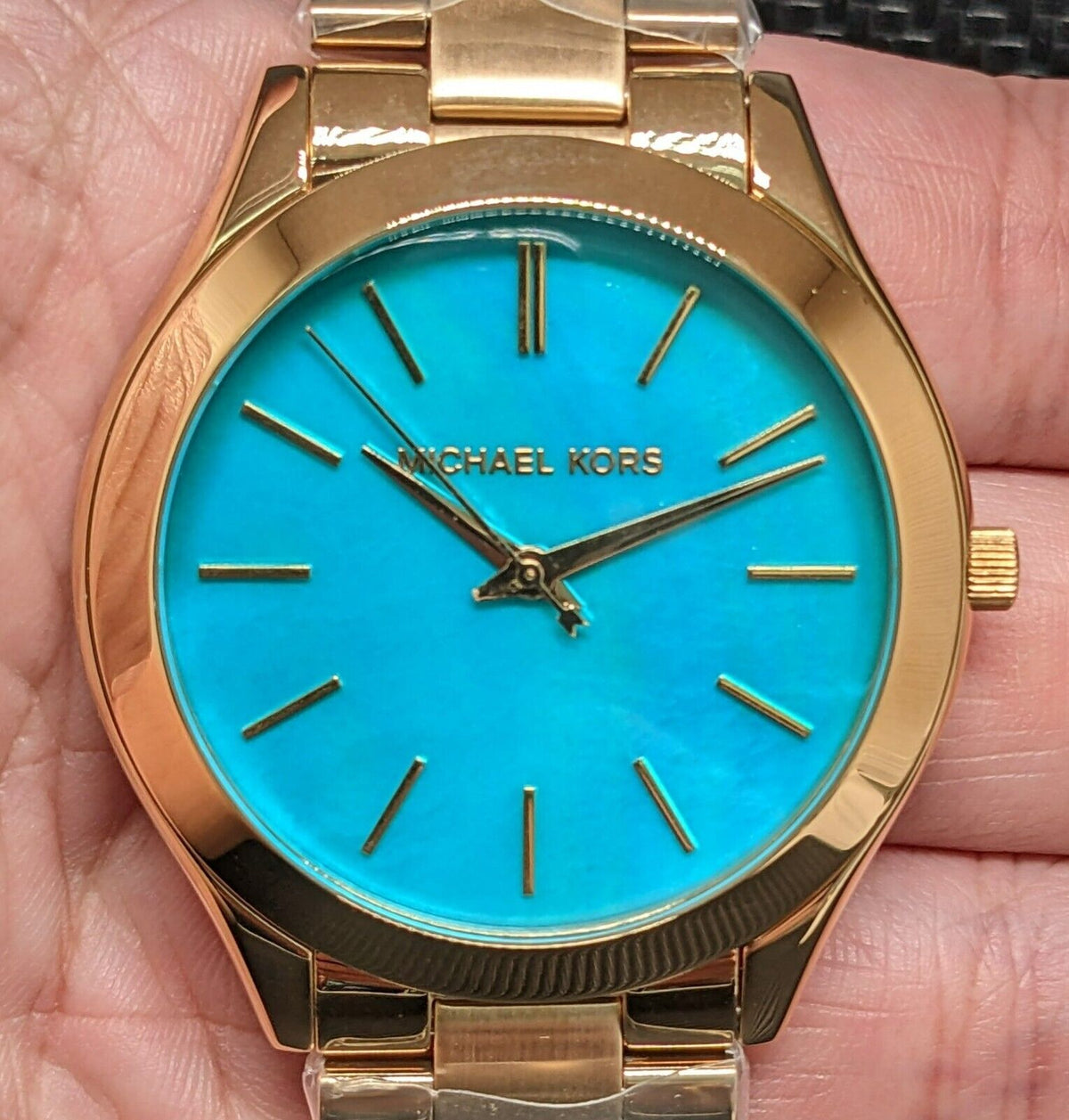  Shop Authentic Michael Kors Slim Runway Blue Mother of Pearl Dial Gold Steel Strap Watch for Women - MK3492 - Luxxuri