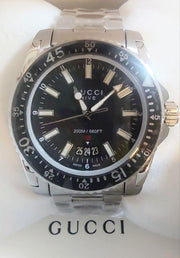  Shop Authentic Gucci Dive Quartz Black Dial Silver Steel Strap Watch For Men - YA136301 - Luxxuri