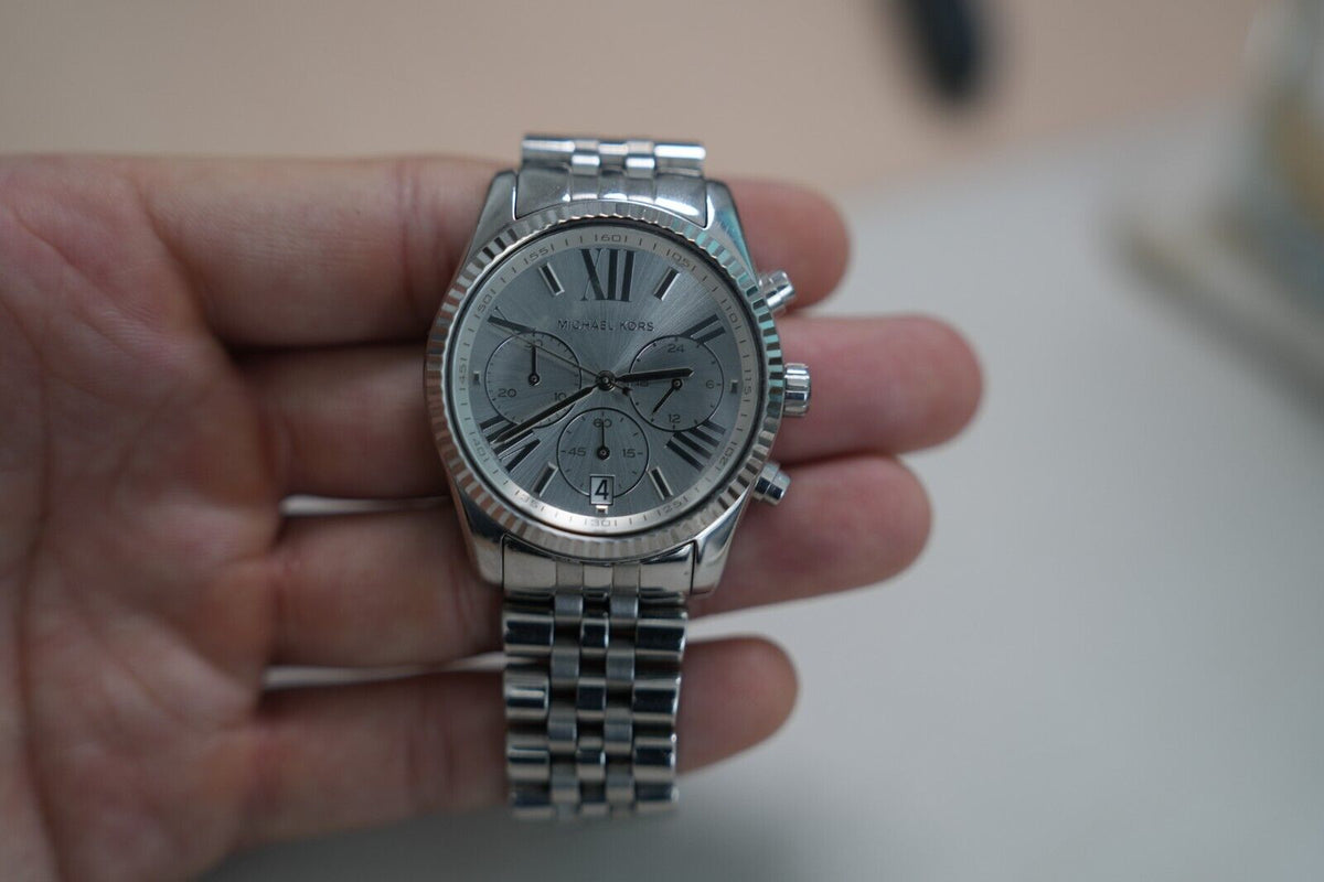  Shop Authentic Michael Kors Lexington Silver Dial Silver Steel Strap Watch for Women - MK5555 - Luxxuri