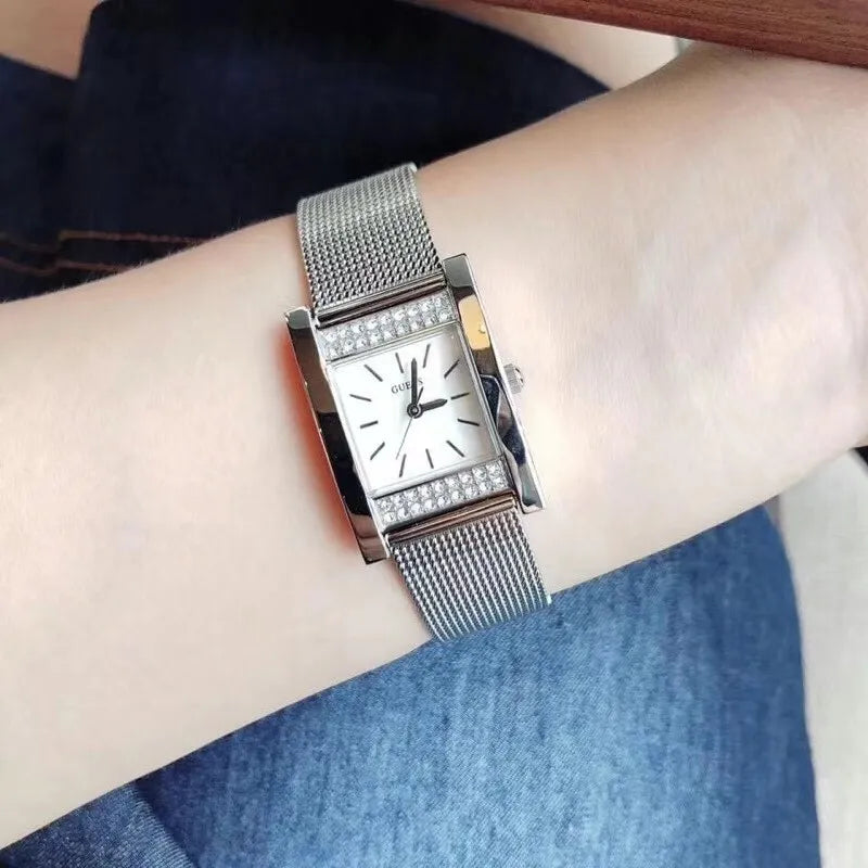  Shop Authentic Guess Nouveau Diamonds Silver Dial Silver Mesh Bracelet Watch for Women - W0127L1 - Luxxuri