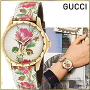  Shop Authentic Gucci G Timeless Floral Gold Dial White Leather Strap Watch For Women - YA1264084 - Luxxuri