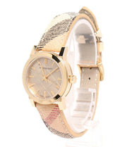  Shop Authentic Burberry The City Gold Dial Haymarket Brown Leather Strap Watch for Women - BU9219 - Luxxuri
