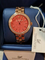  Shop Authentic Swarovski Daytime Quartz Coral Dial Rose Gold Steel Strap Watch for Women - 5182250 - Luxxuri