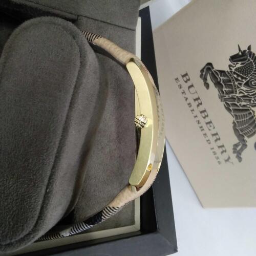  Shop Authentic Burberry Pioneer Champagne Dial Haymarket Beige Leather Strap Watch for Women - BU9407 - Luxxuri