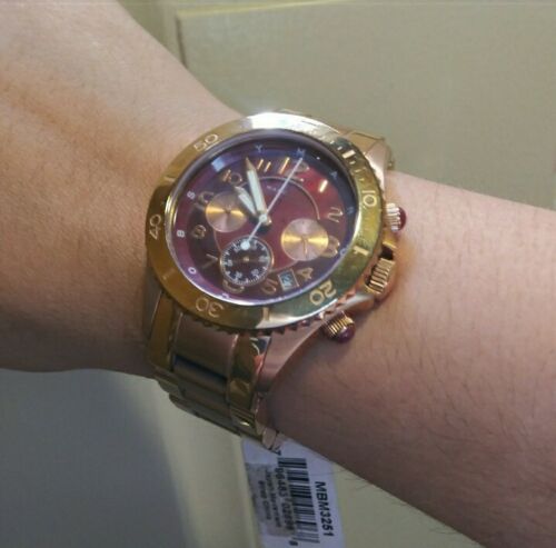  Shop Authentic Marc Jacobs Rock Chronograph Mother of Pearl Red Dial Rose Gold Steel Strap Unisex Watch - MBM3251 - Luxxuri