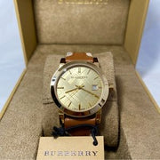  Shop Authentic Burberry The City Gold Dial Brown Leather Strap Watch for Women - BU9133 - Luxxuri