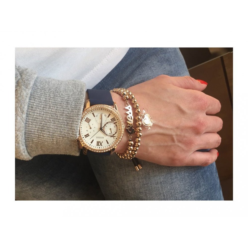  Shop Authentic Guess Solar White Rose Gold Dial Blue Rubber Strap Watch For Women - W1135L3 - Luxxuri