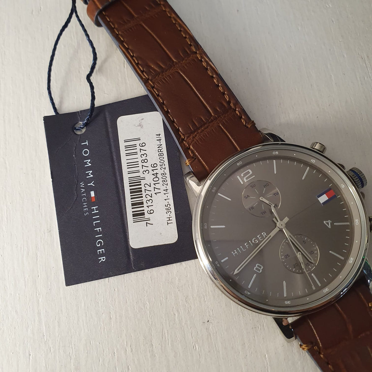  Shop Authentic Tommy Hilfiger Daniel Grey Dial Brown Leather Strap Watch for Men - 1710416 - Luxxuri