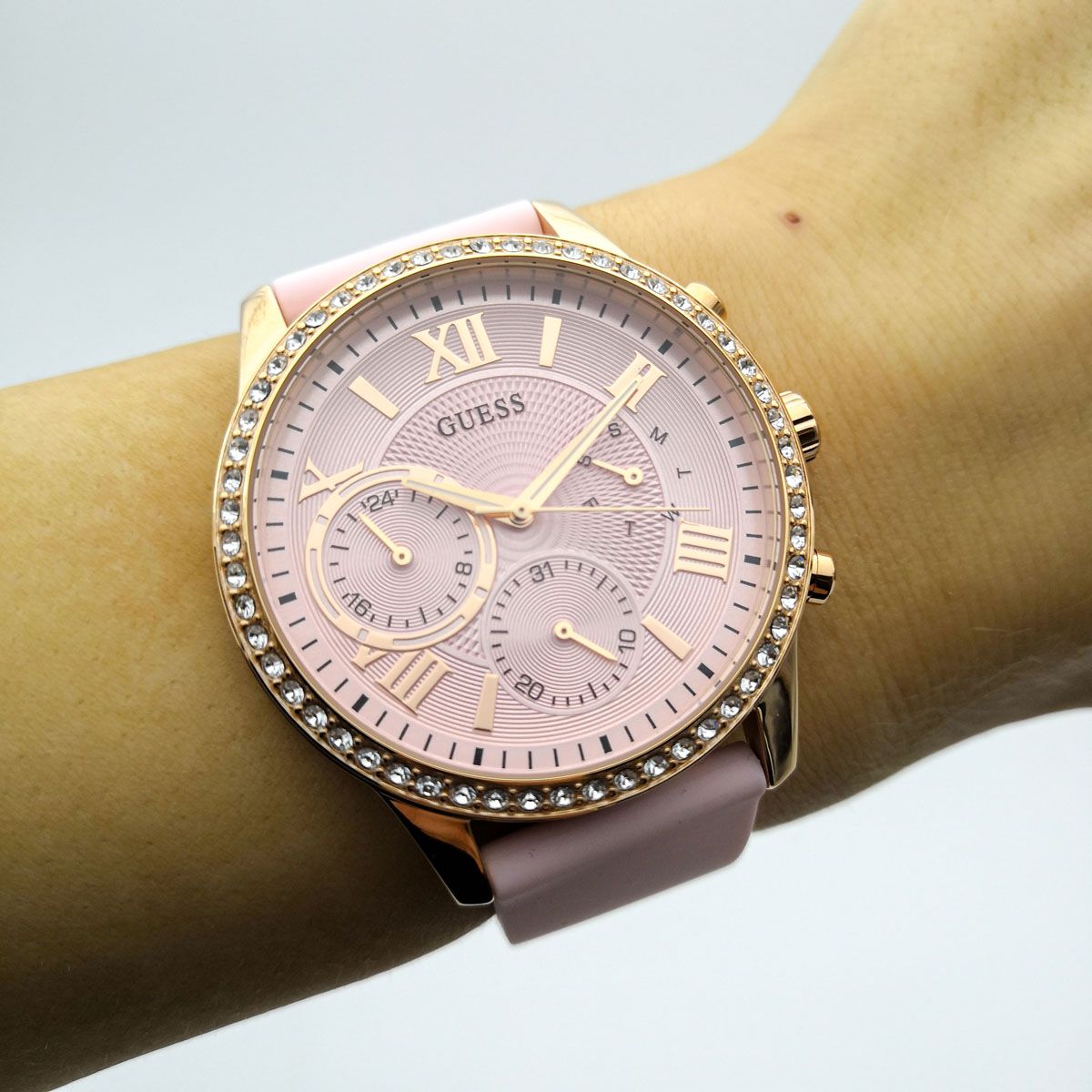  Shop Authentic Guess Solar Rose Gold Dial Pink Rubber Strap Watch For Women - W1135L2 - Luxxuri
