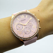  Shop Authentic Guess Solar Rose Gold Dial Pink Rubber Strap Watch For Women - W1135L2 - Luxxuri