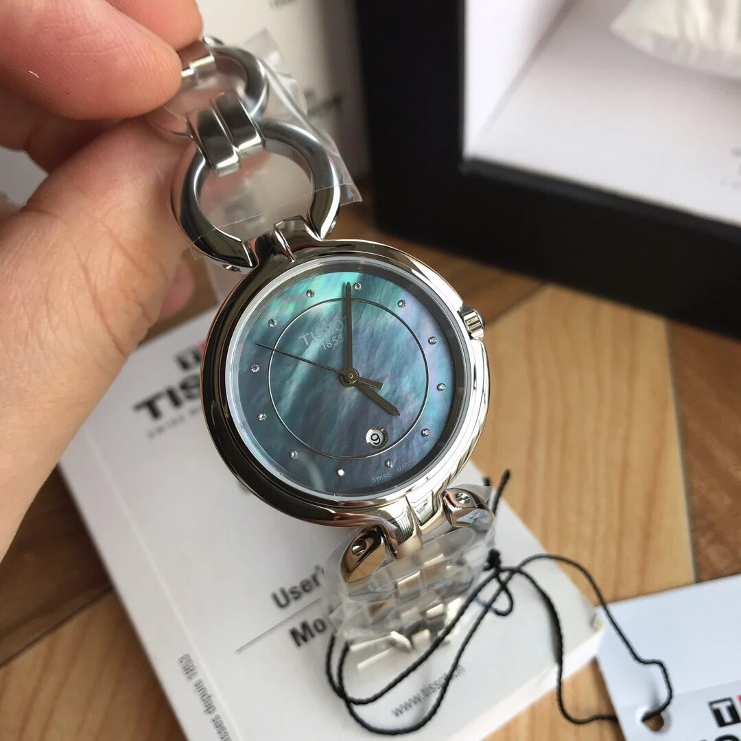  Shop Authentic Tissot T Lady Flamingo Mother of Pearl Blue Dial Silver Steel Strap Watch for Women - T094.210.11.126.00 - Luxxuri