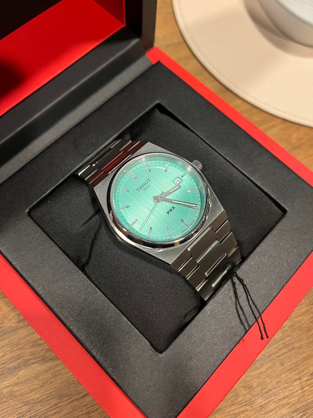  Shop Authentic Tissot PRX Quartz Light Green Dial Silver Steel Strap Watch for Men - T137.410.11.091.01 - Luxxuri