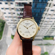  Shop Authentic Tissot Le Locle Powermatic 80 Gold Dial Brown Leather Strap Watch For Men - T006.407.36.263.00 - Luxxuri