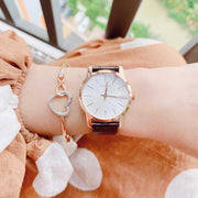  Shop Authentic Calvin Klein City White Mother of Pearl Dial Brown Leather Strap Watch for Women - K2G23620 - Luxxuri