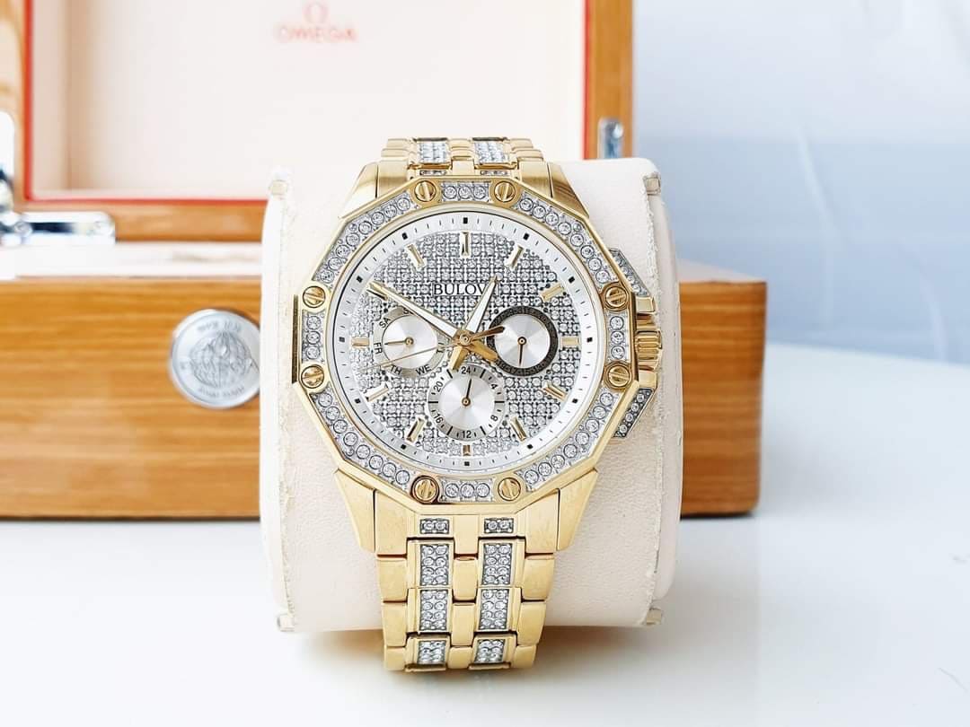 Shop Authentic Bulova Crystal Collection Octova White Dial Gold Steel Strap Watch for Men - 98C126 - Luxxuri